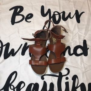 Hi, I am selling brown sandals to anyone.